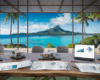 Bureau d'agence immobilière avec vue sur Moorea et documents d'investissement locatif en Polynésie française